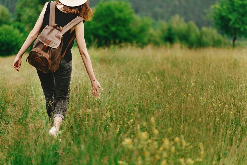 woman walking in a field