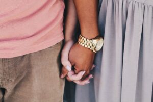 couple holding hands - unsplash, no credit