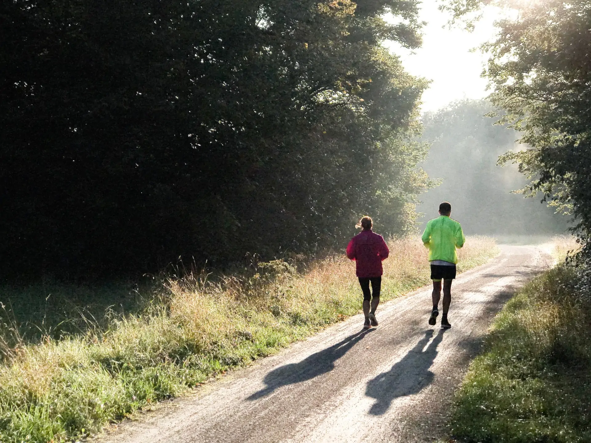 two people running, why exercise makes us happy